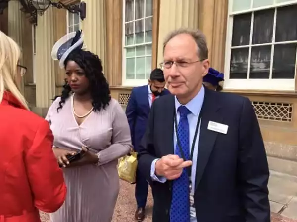 Nigerian Lady Honoured By Queen Elizabeth Arrives Kensington Palace With Her Dad. Photos